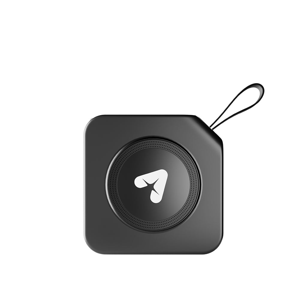 Compact black portable wireless speaker with wrist strap on white background