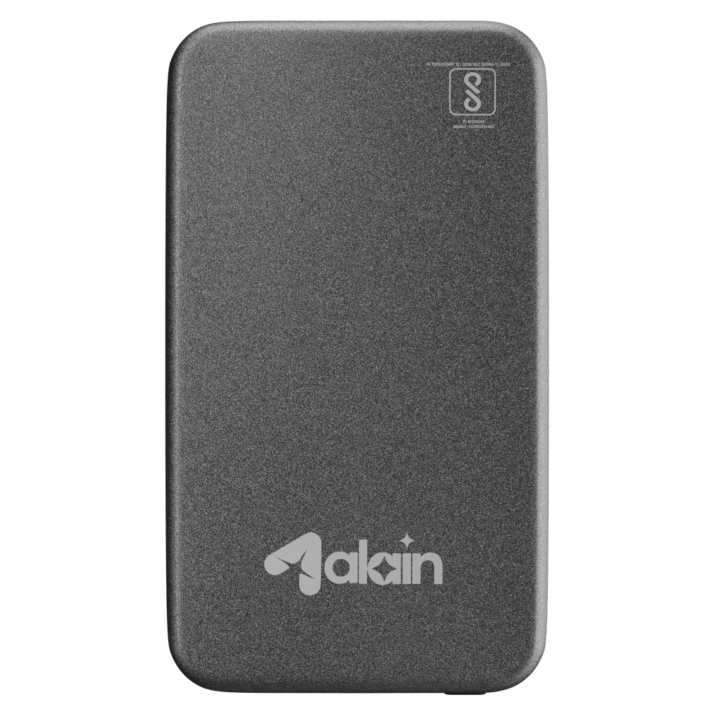 Sleek black portable power bank with rounded edges and minimalist design