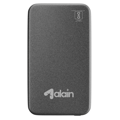 Sleek black portable power bank with rounded edges and minimalist design