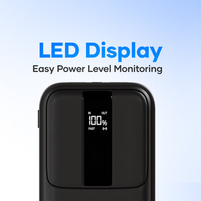 Black power bank with LED display showing battery percentage and fast charging status